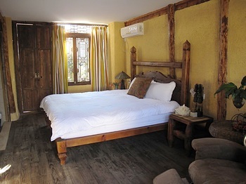 丽江(含束河)丽江束河古镇情人结客栈颦笑大床房 颦笑大床房